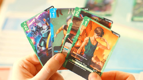 A hand of Gundam Card Game cards